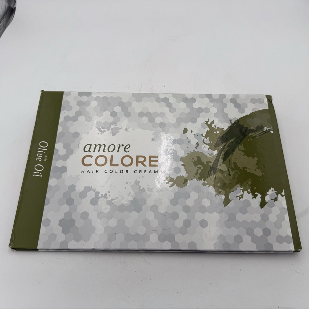 Amore Colore Swatch Book. Some light ware to the book